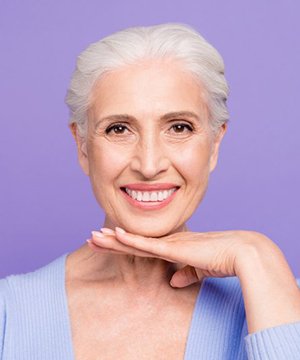 woman with dental implants in Virginia Beach